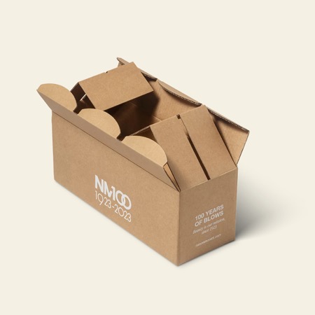 An open die-cut kraft carton with shaped internal dividers